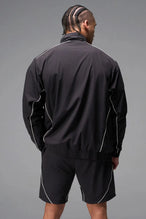 Back View of Black TLF Track Jacket (Men’s GTS Gym-To-Street Edition) with mesh lining, reflective piping, and premium trims for all-day Gym-To-Street wear. 