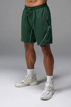 Front View of Green TLF Track Shorts (Men’s GTS Gym-To-Street Edition) featuring side zipper pockets, mesh lining and reflective piping details.