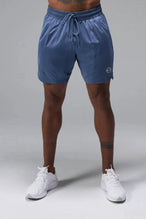 Front View of Blue TLF Train Element 7 Inch Shorts featuring a 7 inch in seam and side zipper pockets designed for optimal performance