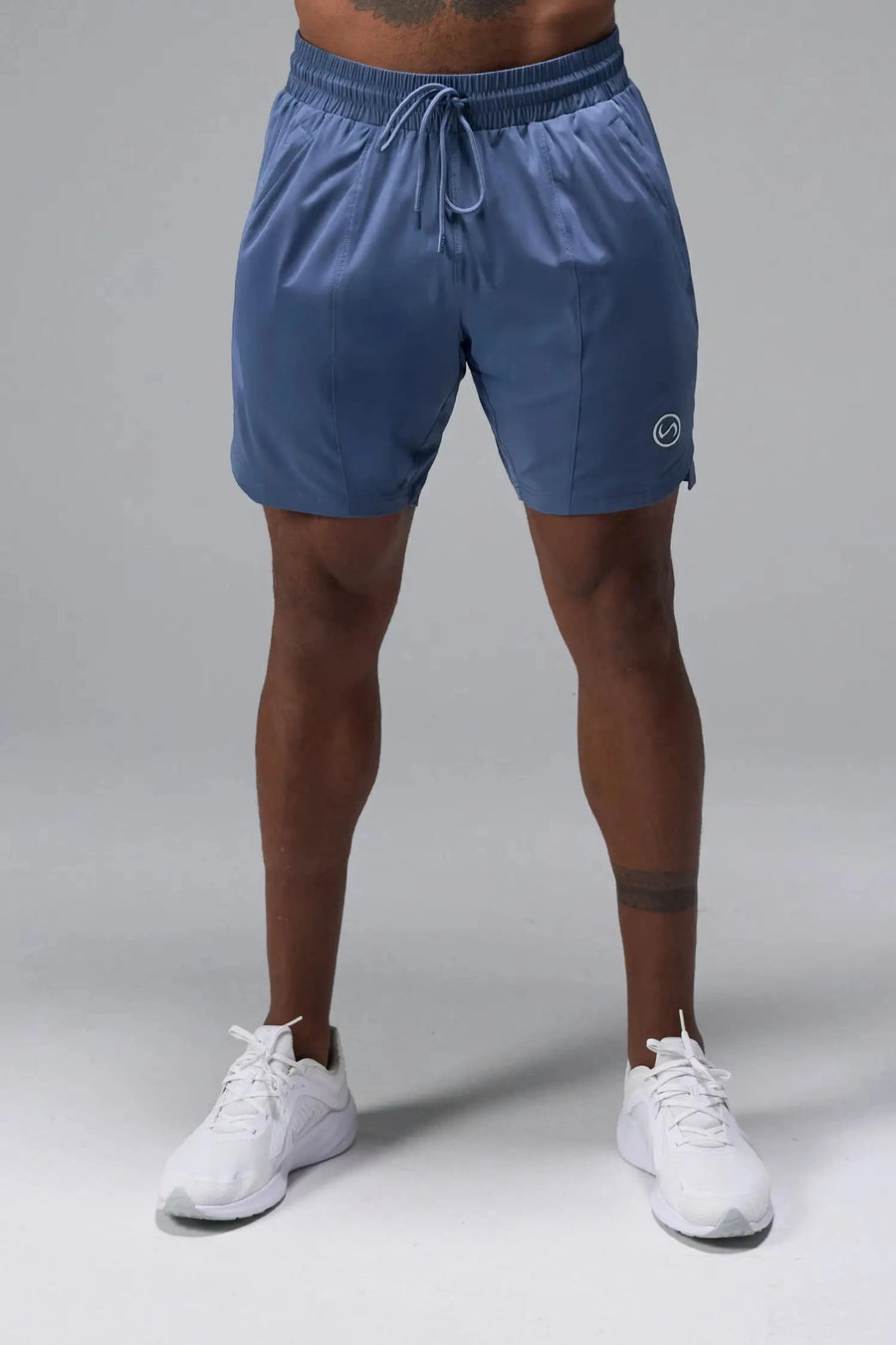 Front View of Blue TLF Train Element 7 Inch Shorts featuring a 7 inch in seam and side zipper pockets designed for optimal performance