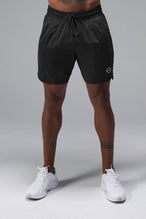 Front View of Black TLF Train Element 7 Inch Shorts featuring a 7 inch in seam and side zipper pockets designed for optimal performance