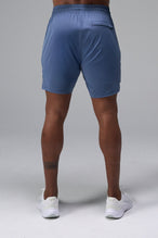 Back View of Blue TLF Train Element 7 Inch Shorts featuring a 7 inch in seam and side zipper pockets designed for optimal performance