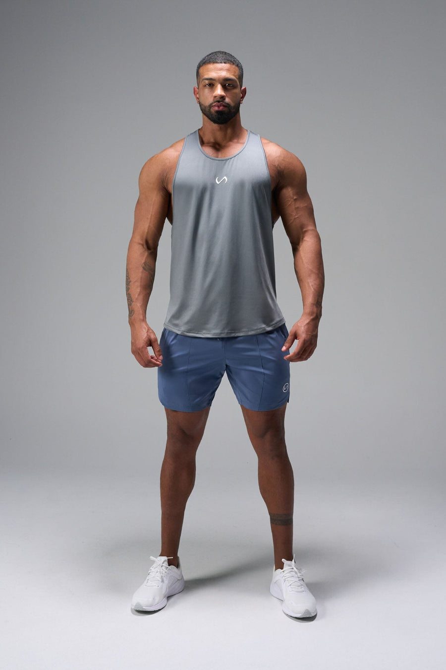 Front View of Blue TLF Train Element 7 Inch Shorts featuring a 7 inch in seam and side zipper pockets designed for optimal performance