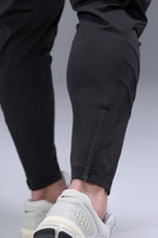 Detail Back View of Black TLF Train Element 7/8 Joggers 2.0, featuring side cargo pockets in an athletic 7/8 length and side zipper pockets 