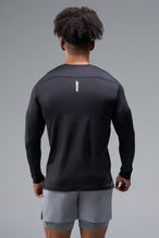 Back View of Black TLF Train Infi-Dry Long Sleeve, featuring our Infi-Dry fabric technology and reflective sleeve design for night running 