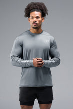 Front View of Gray TLF Train Infi-Dry Long Sleeve, featuring our Infi-Dry fabric technology and reflective sleeve design for night running 