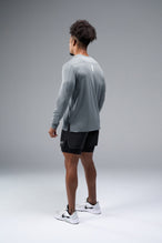 Back View of Gray TLF Train Infi-Dry Long Sleeve, featuring our Infi-Dry fabric technology and reflective sleeve design for night running 