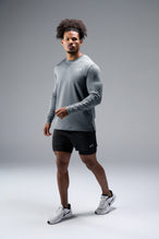 Front View of Gray TLF Train Infi-Dry Long Sleeve, featuring our Infi-Dry fabric technology and reflective sleeve design for night running 