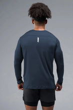 Side View of Blue TLF Infi-Dry Long Sleeve, crafted with our custom swole fit and utilizing our infi-dry fabric technology 