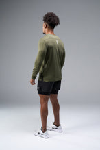 Back View of Green TLF Train Infi-Dry Long Sleeve, featuring our Infi-Dry fabric technology and reflective sleeve design for night running 