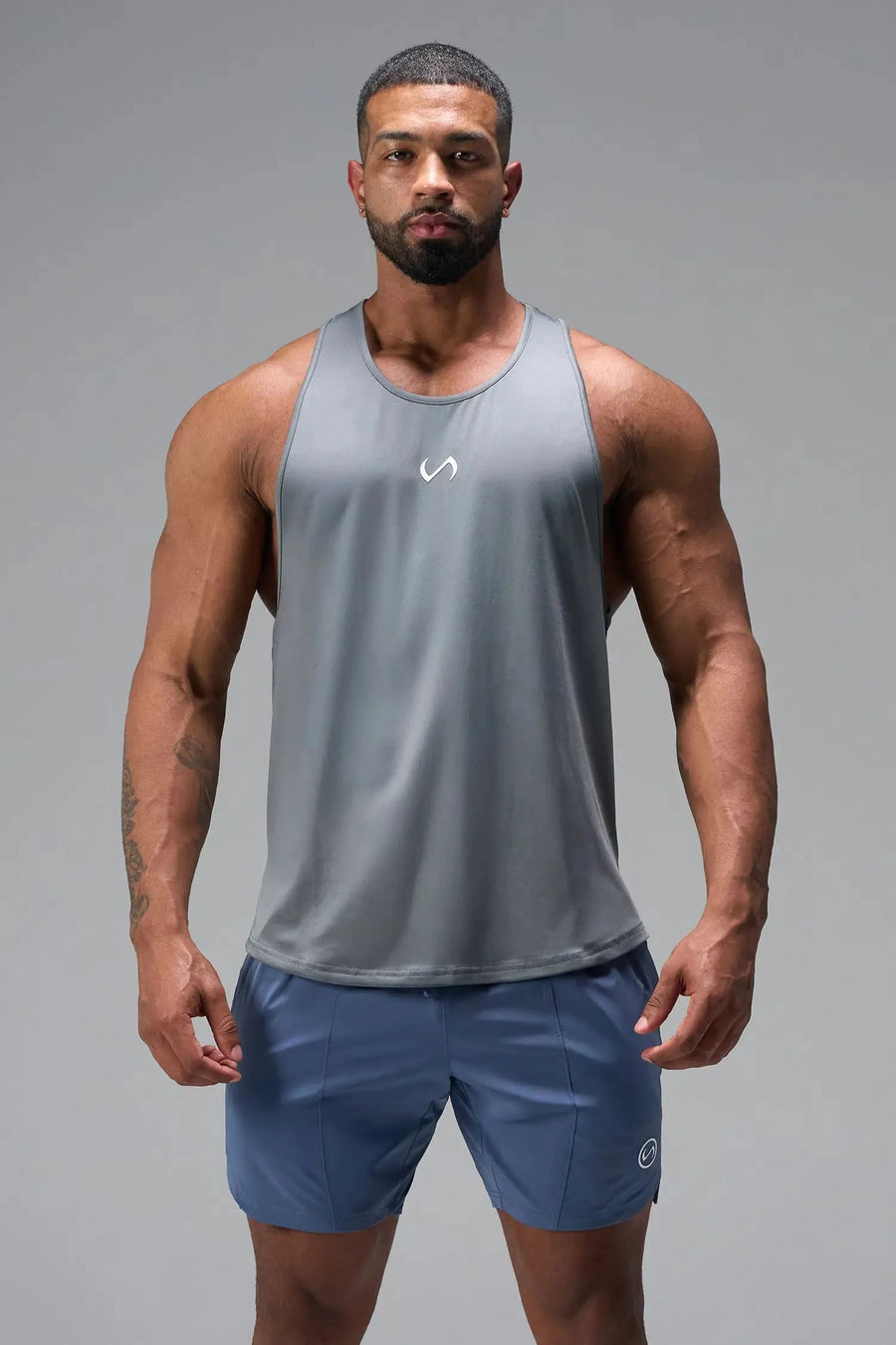 Front View of Gray TLF Infi Dry Stringer Tank featuring a physique enhancing design in our advanced Infi-Dry DNA fabric technology