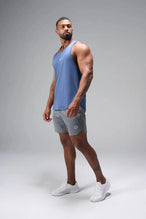 Side View of Blue TLF Infi Dry Stringer Tank featuring a physique enhancing design in our advanced Infi-Dry DNA fabric technology