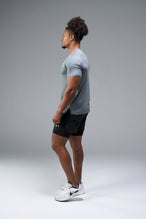 Side View of Quiet Shade TLF Infi-Dry Swole Tee, crafted with our custom swole fit and utilizing our infi-dry fabric technology 