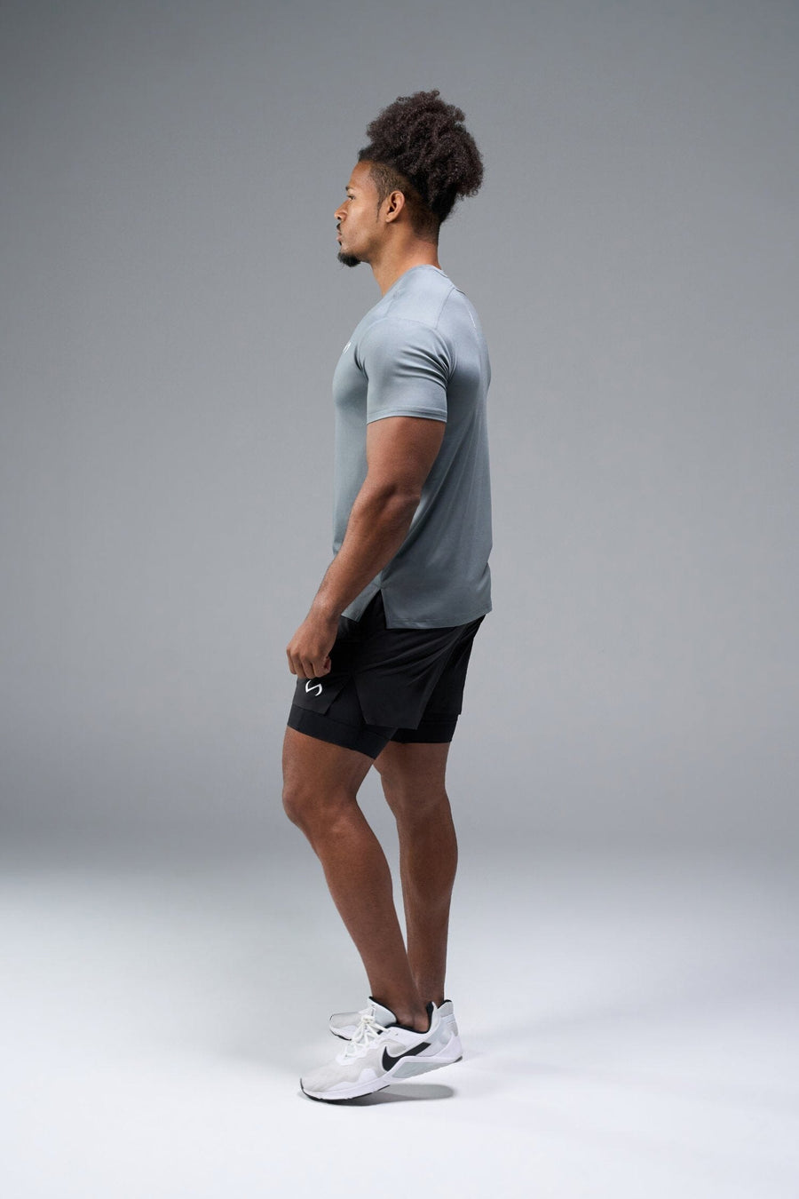 Side View of Quiet Shade TLF Infi-Dry Swole Tee, crafted with our custom swole fit and utilizing our infi-dry fabric technology 