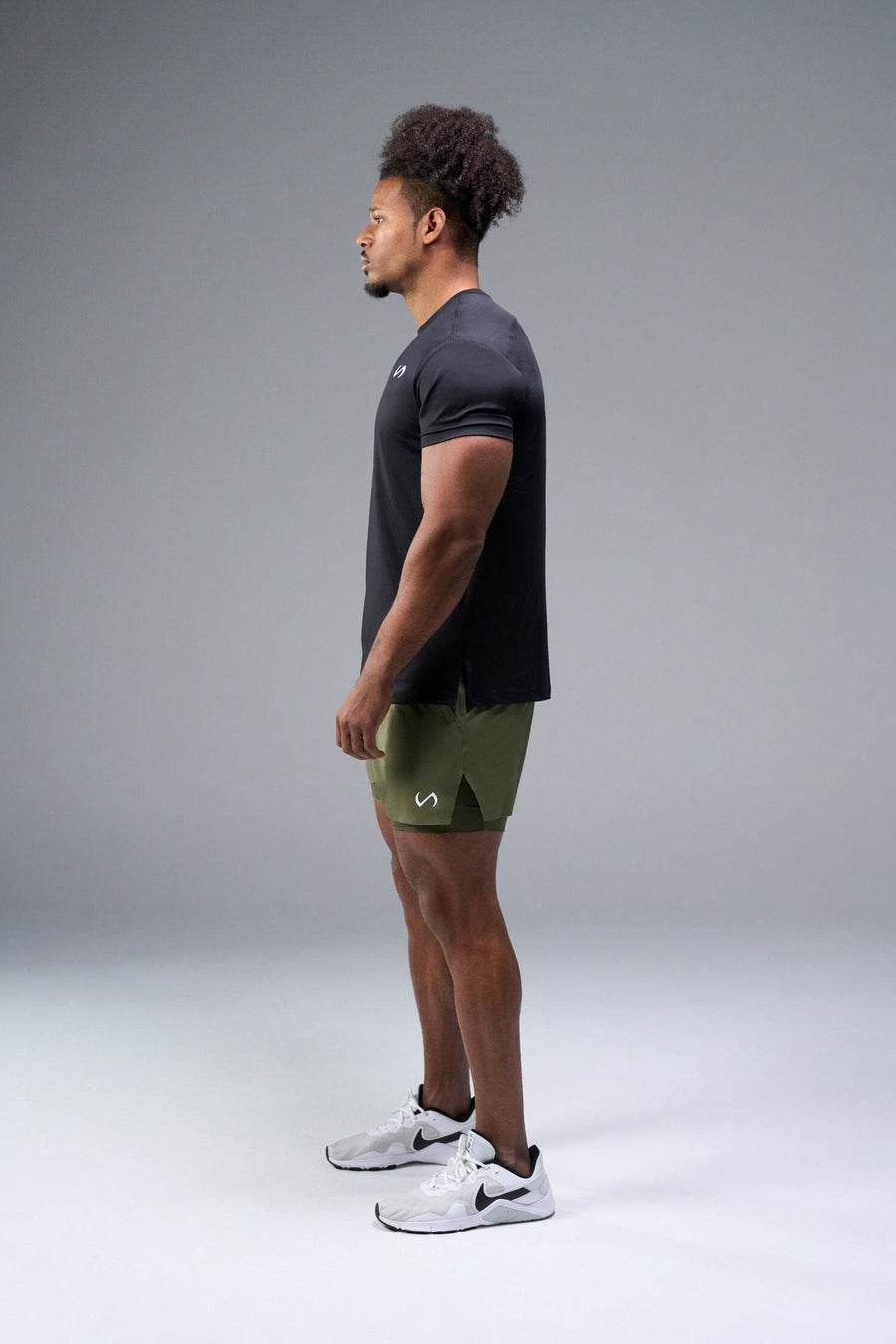 Side View of Black TLF Infi-Dry Swole Tee, crafted with our custom swole fit and utilizing our infi-dry fabric technology 