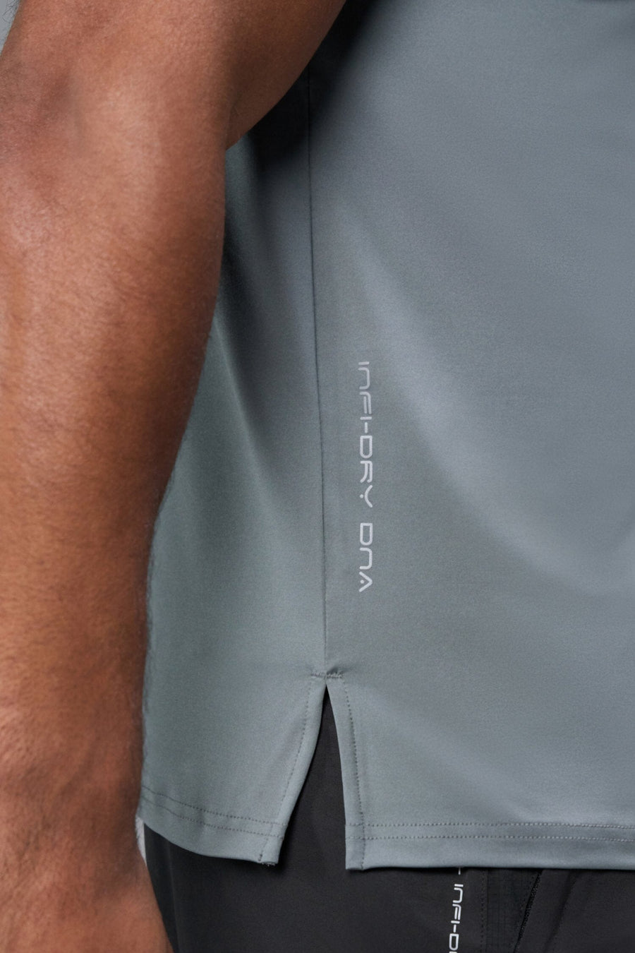 Side View of Quiet Shade TLF Infi-Dry Swole Tee, crafted with our custom swole fit and utilizing our infi-dry fabric technology