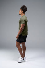 Side View of Green TLF Infi-Dry Swole Tee, crafted with our custom swole fit and utilizing our infi-dry fabric technology 