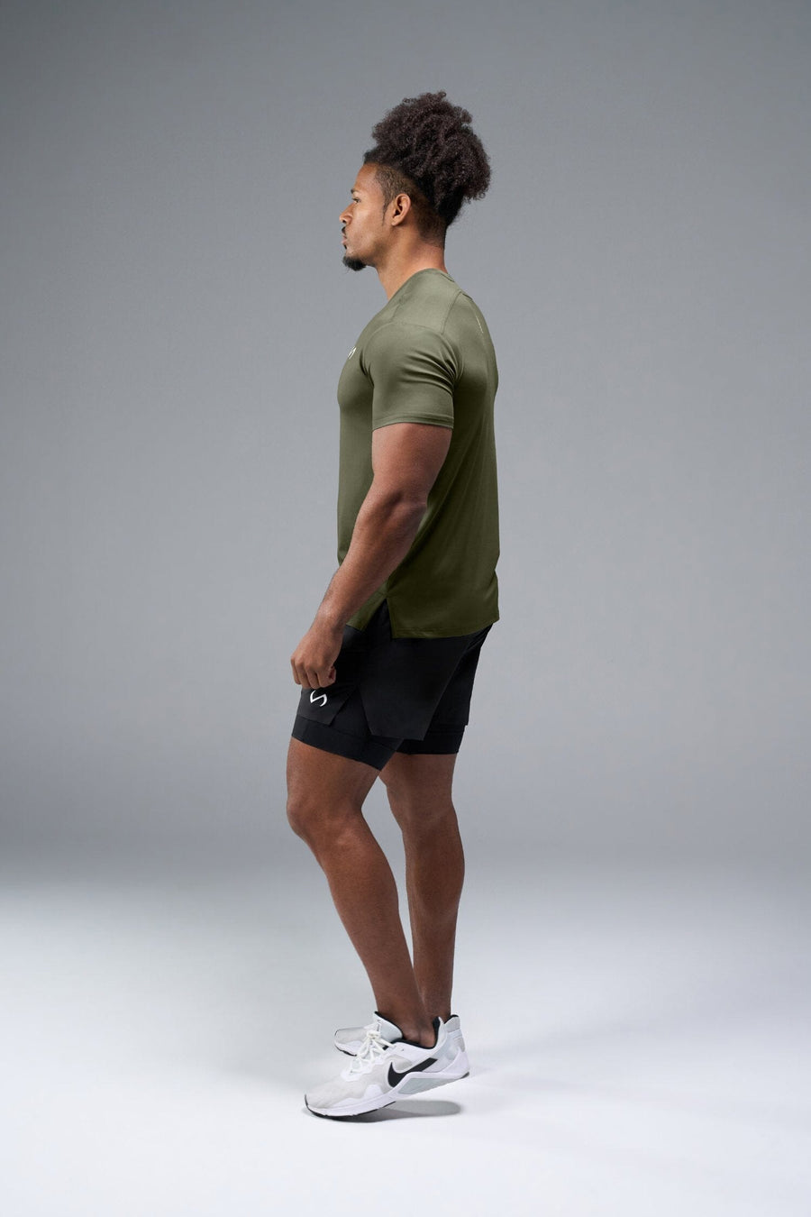 Side View of Green TLF Infi-Dry Swole Tee, crafted with our custom swole fit and utilizing our infi-dry fabric technology 