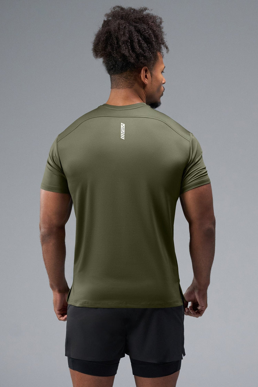 Back View of Green TLF Infi-Dry Swole Tee, crafted with our custom swole fit and utilizing our infi-dry fabric technology 