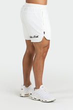 Side View of White Train Like a Freak 5 Inch Mesh Shorts