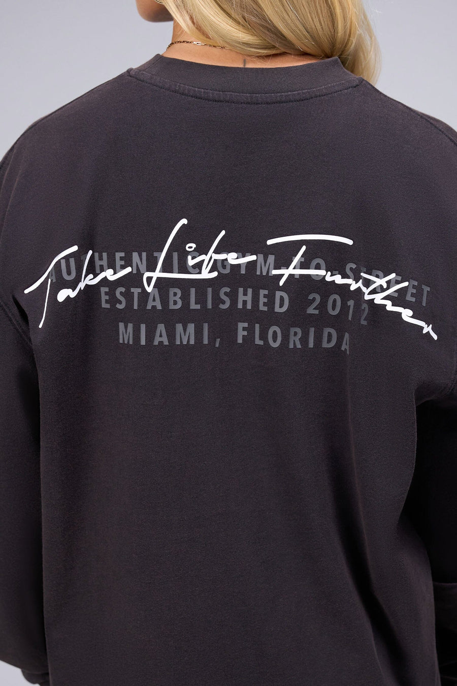 Detail Back View of Black TLF Unisex Arc Dura Cotton Oversized Long Sleeve, durable, breathable long sleeve shirt for gym or casual wear