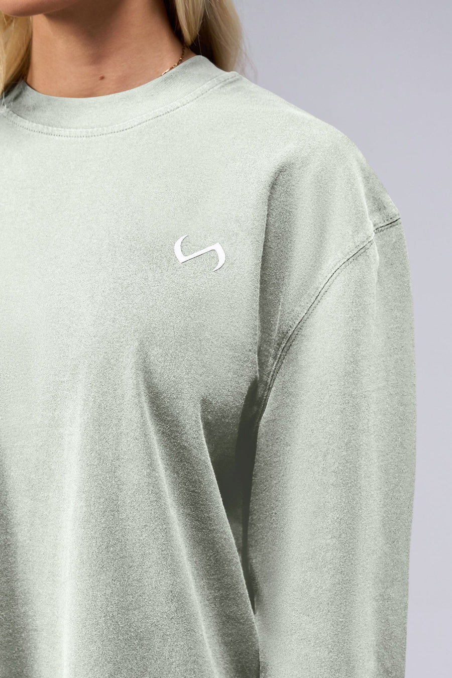 Detail Front View of Sage Green TLF Unisex Arc Dura Cotton Oversized Long Sleeve, durable, breathable long sleeve shirt for gym or casual wear