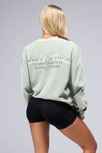 Back View of Sage Green TLF Unisex Arc Dura Cotton Oversized Long Sleeve, durable, breathable long sleeve shirt for gym or casual wear