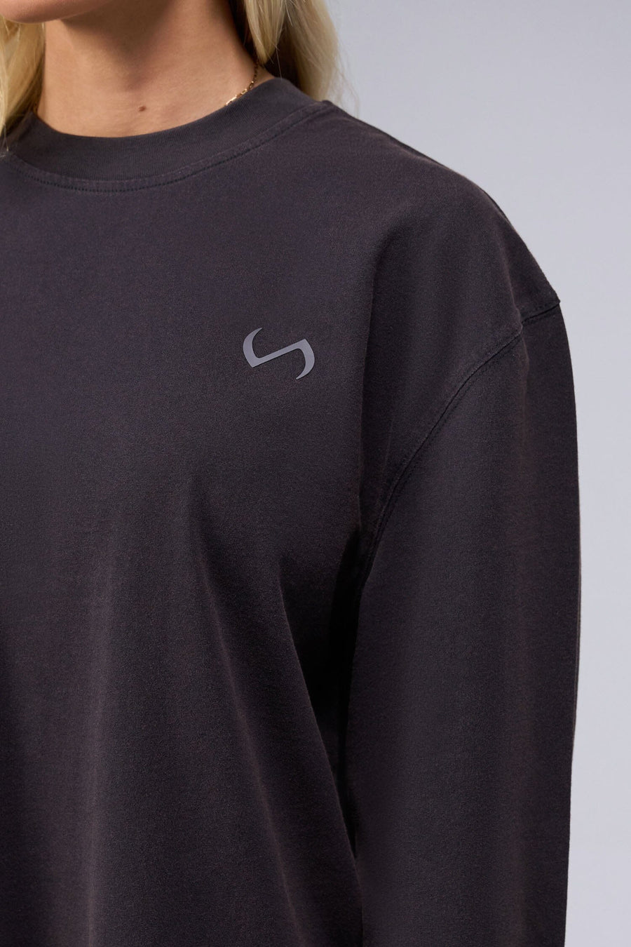 Detail Front View of Black TLF Unisex Arc Dura Cotton Oversized Long Sleeve, durable, breathable long sleeve shirt for gym or casual wear