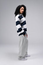 Side View Of TLF Unisex Long Sleeve Rugby Shirt White Navy