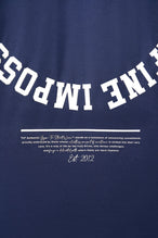 Detail Back View of Blue the TLF Redefine Original Cotton Luxe Oversized LS Tee that features a bold back graphic in an oversized fit. 