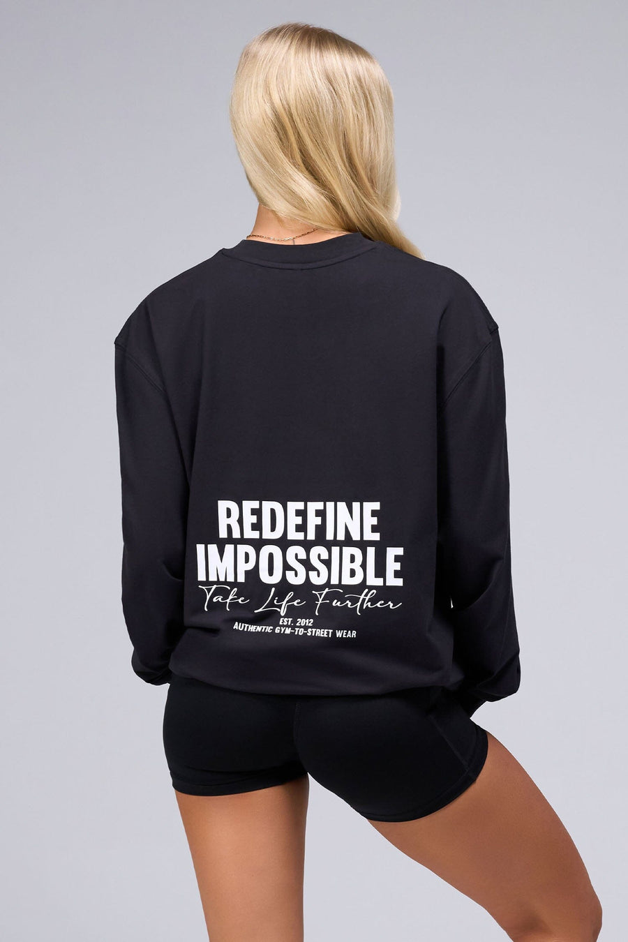 Back View Of Unisex Redefine Cotton Luxe Oversized Long Sleeve in Black