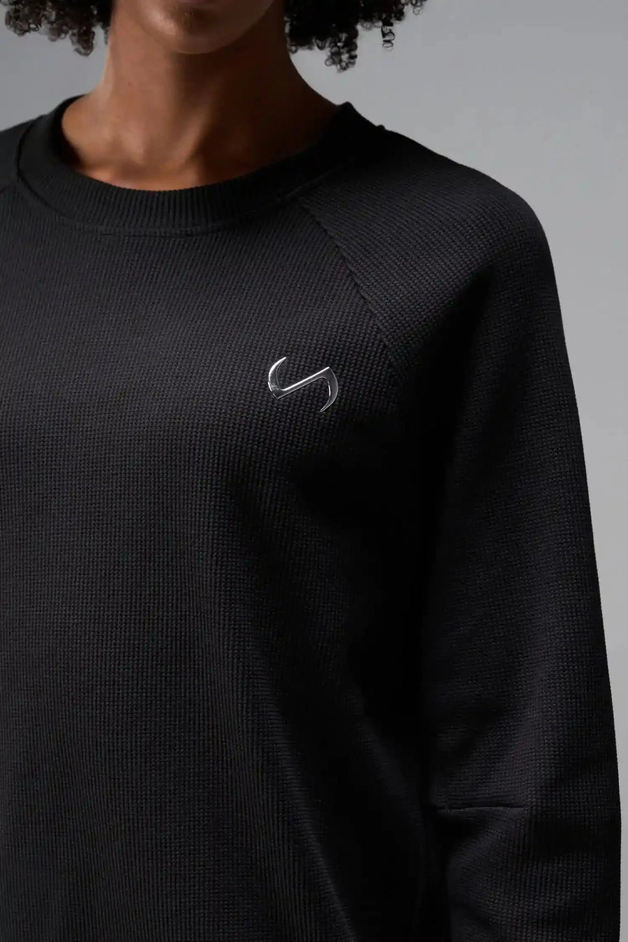 Front View of Black the TLF Waffle Tech Crew Neck featuring a raglan sleeve in our premium waffle knit fabric