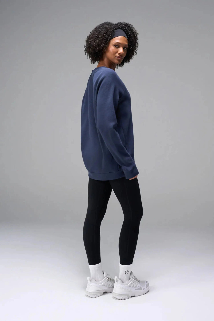 Side View of Blue the TLF Waffle Tech Crew Neck featuring a raglan sleeve in our premium waffle knit fabric