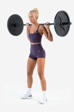 Full Model Image of Tempo 4" Workout Shorts Dark Grape