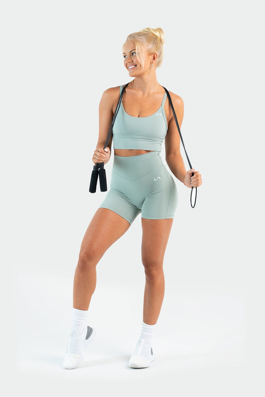 Full Model Image of Tempo 6" Workout Shorts Sage Green